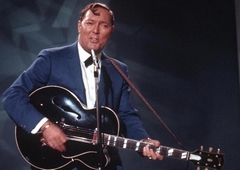 Певец, гитарист Билл Хейли.